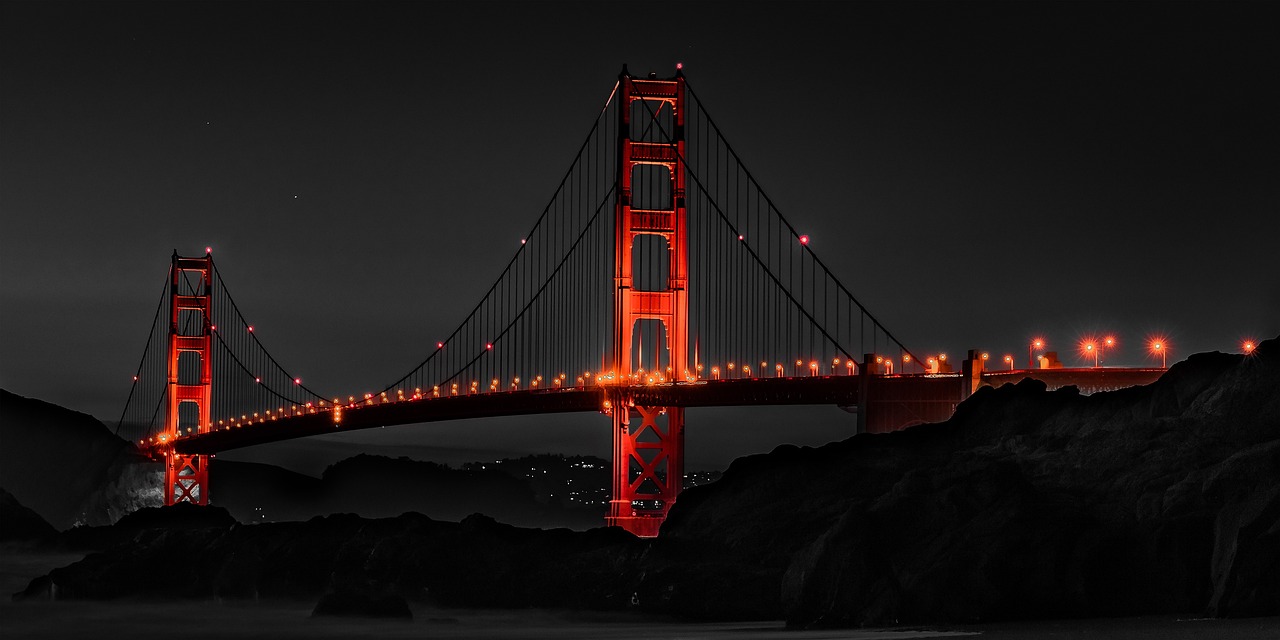 The golden gate bridge at night.